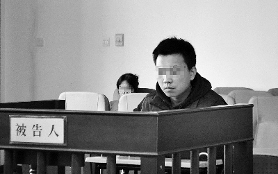 吴华受审认罪 摄/记者 唐李晗