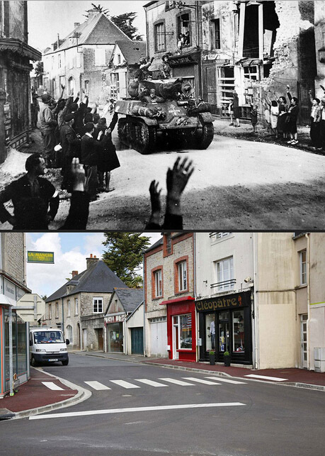 在通过圣梅格里斯小镇（Sainte Mere Eglise）时，法国坦克受到热烈欢迎。今天，曾被轰炸的建筑变成了服装店。