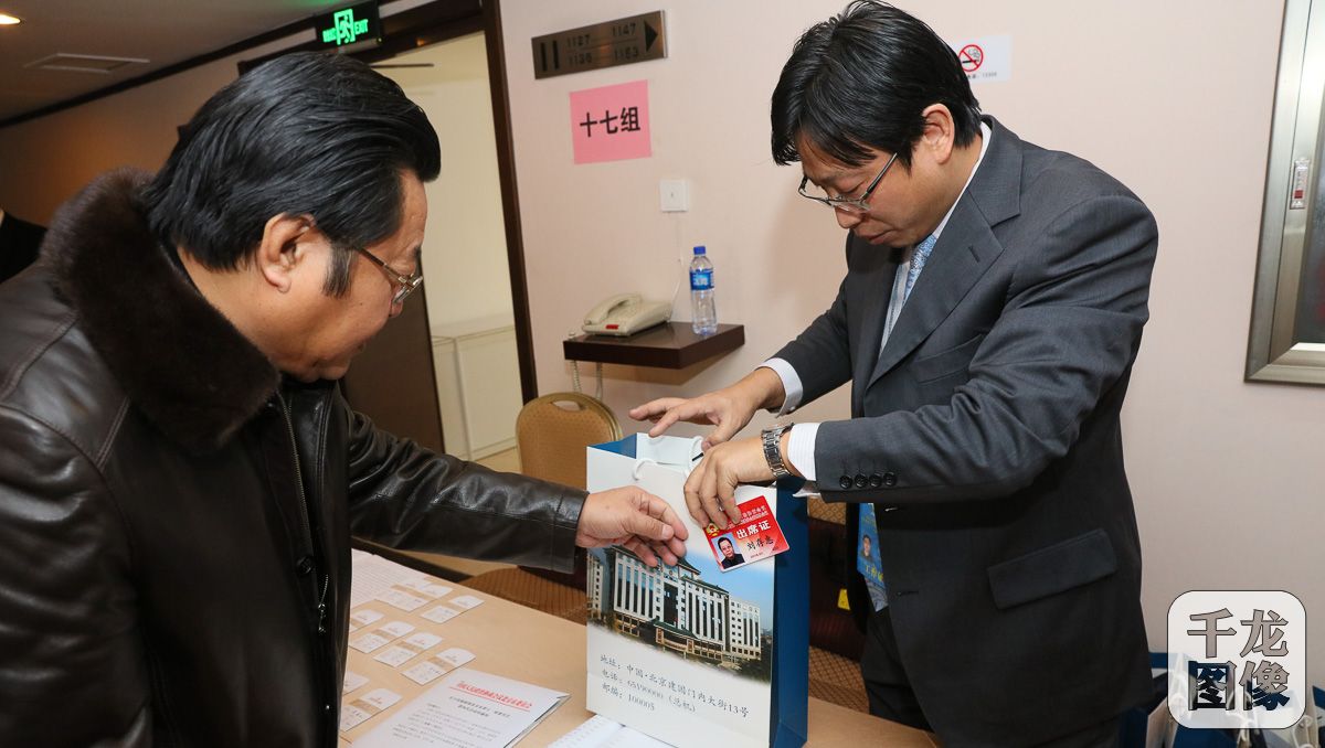 1月20日，政协委员刘存慧到会议驻地报到。千龙网记者 宋鹏飞摄