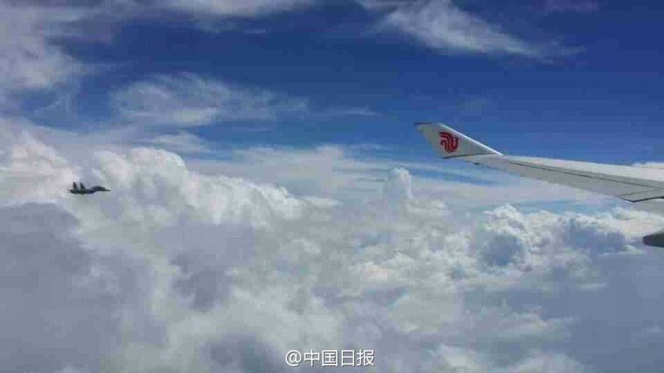 沙埃派12架战机为习近平护航 国际上为专机护