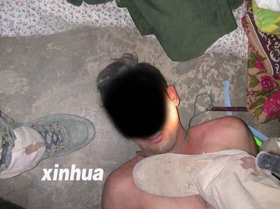 美军虐囚照片：场面触目惊心