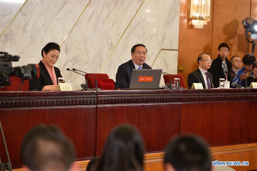 Wang Guoqing (C), spokesperson for the Fourth Session of the 12th Chinese People's Political Consultative Conference (CPPCC) National Committee, attends a press conference at the Great Hall of the People in Beijing, capital of China, March 2, 2016. 