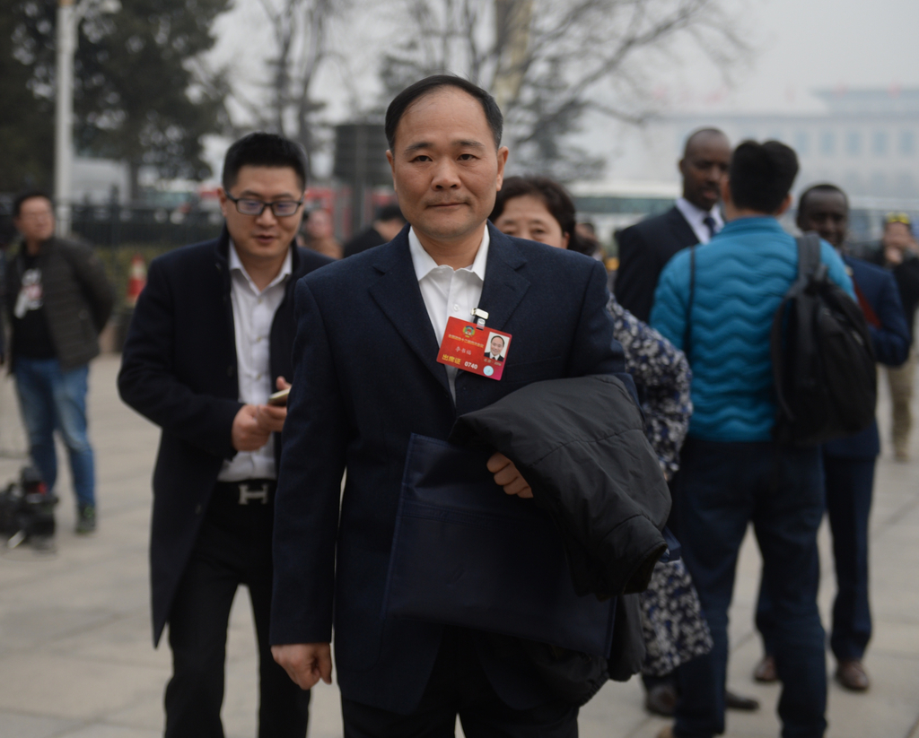 2016年3月3日，北京，政协开幕。吉利集团董事长李书福到场参加会议。