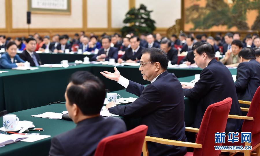 3月6日，中共中央政治局常委、国务院总理李克强参加十二届全国人大四次会议山东代表团的审议。新华社记者 高洁 摄