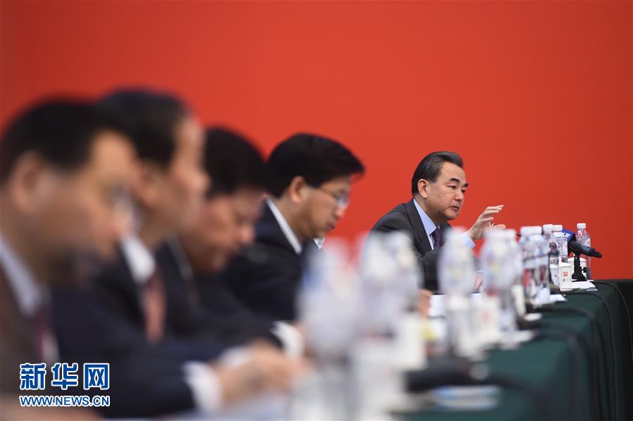 3月7日，十二届全国人大四次会议浙江代表团举行全体会议，外交部部长王毅到会听取建议。 新华社记者金良快摄