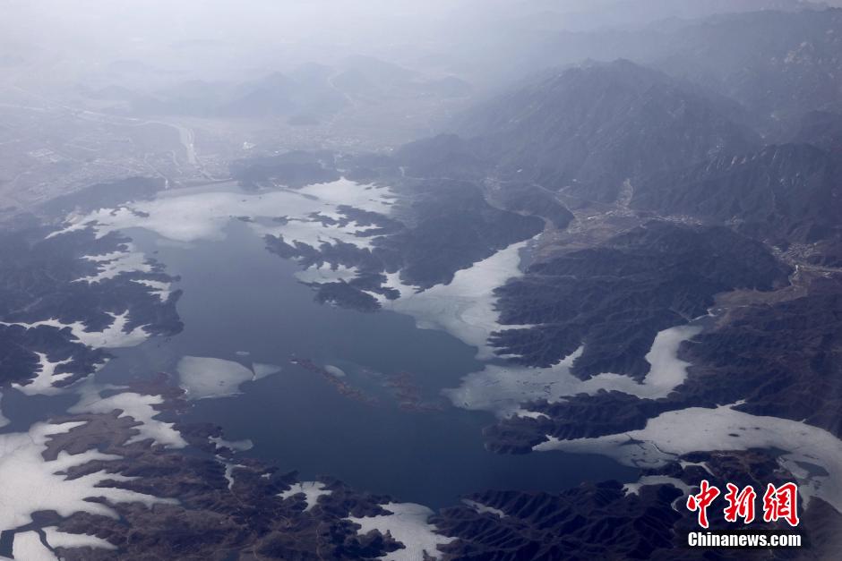 北京气温迅速回升 密云水库冰雪消融