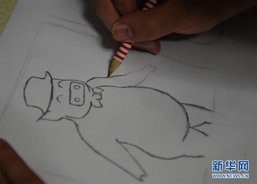 （图片故事）（6）“80后”爸爸为孩子绘制近百本绘本