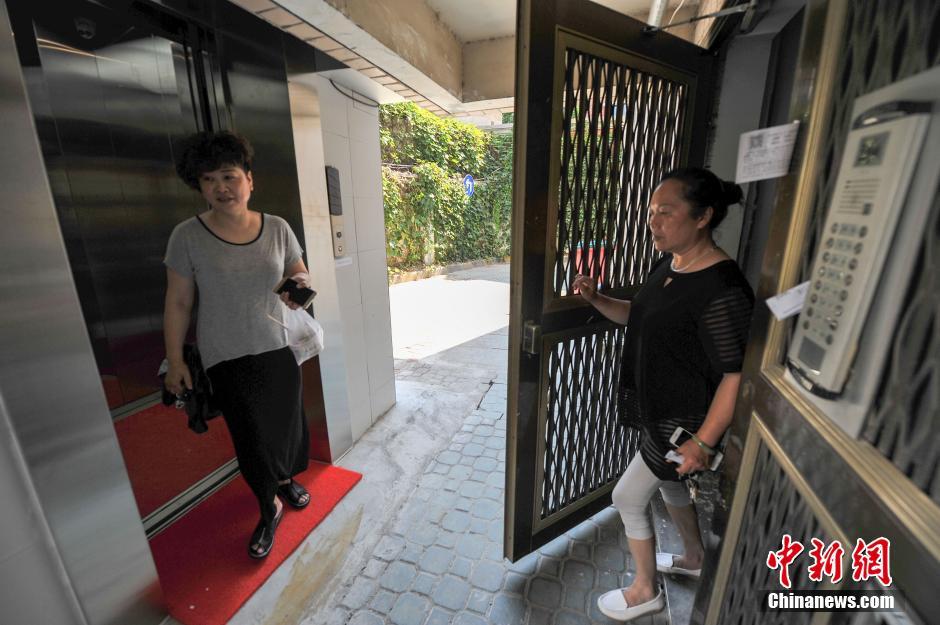 武汉居民自筹百万加装电梯