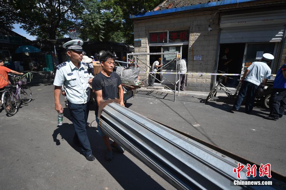 北京白塔寺将建“精品胡同” 整治封堵平房“开墙打洞”