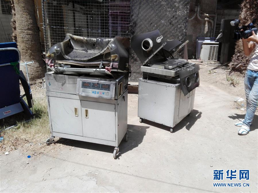 这是8月10日在伊拉克巴格达雅尔穆克医院拍摄的在火灾中损毁的育婴箱。伊拉克警方10日说，伊拉克首都巴格达西部的雅尔穆克医院当天上午发生火灾，目前已有至少20名婴儿在火灾中窒息死亡。大火已被扑灭，起火确切原因仍在调查中。新华社发（哈利勒·达乌德摄）