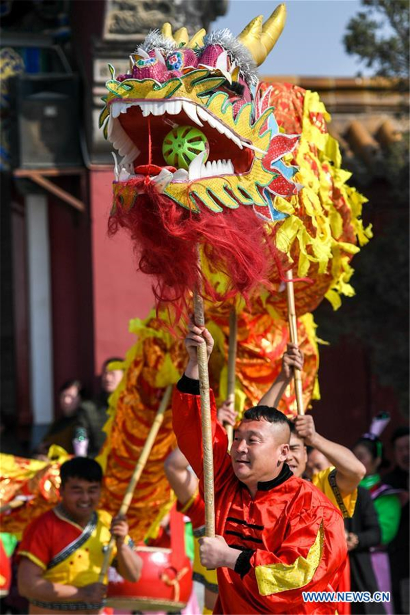 Chinese people celebrate Er Yue Er