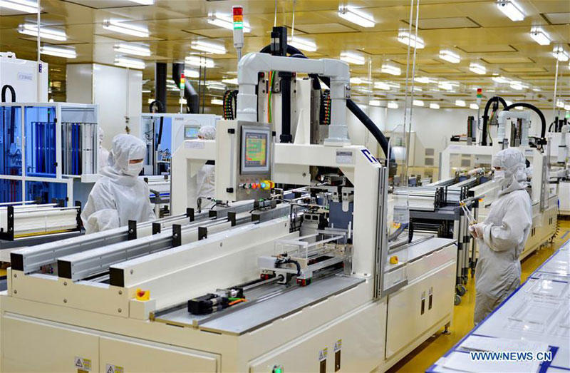 Workers work in a factory of Jinglong Industry and Commerce Group in Xingtai, north China's Hebei Province, Jan. 25, 2017. China's manufacturing purchasing managers' index (PMI) came in at 51.3 in January, 0.1 percentage points lower than that recorded in December, according to data released Wednesday by the National Bureau of Statistics (NBS). (Xinhua file photo/Mu Yu)