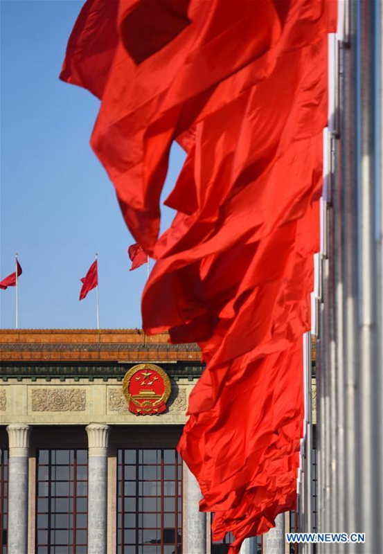 Red flags are seen at the Tian'anmen Square and atop the Great Hall of the People before the fifth session of China's 12th National People's Congress (NPC) in Beijing, capital of China, March 5, 2017. The fifth session of the 12th NPC opened in Beijing on March 5. (Xinhua/Chen Yehua)
