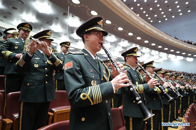 The military band of Chinese People's Liberation Army plays the national anthem during the opening meeting of the fifth session of China's 12th National People's Congress (NPC) at the Great Hall of the People in Beijing, capital of China, March 5, 2017. (Xinhua/Xie Huanchi) 