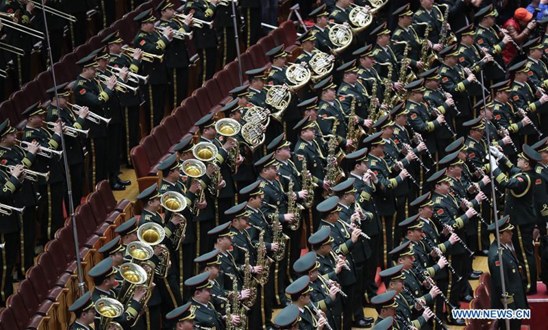 The military band of Chinese People's Liberation Army performs during the opening meeting of the fifth session of China's 12th National People's Congress (NPC) in Beijing, capital of China, March 5, 2017. (Xinhua/Ju Peng)