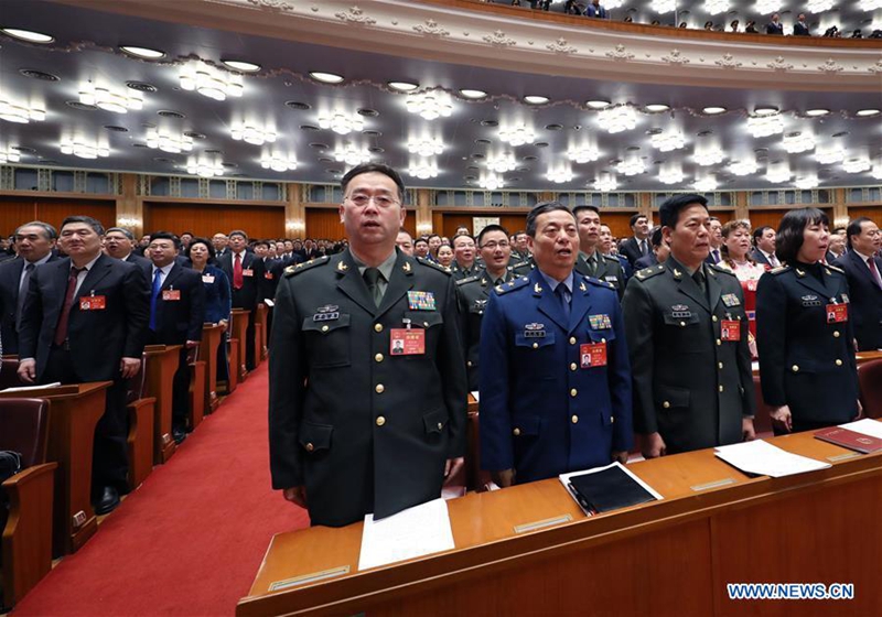 Deputies sing the national anthem during the opening meeting of the fifth session of China's 12th National People's Congress (NPC) at the Great Hall of the People in Beijing, capital of China, March 5, 2017. (Xinhua/Li Gang) 