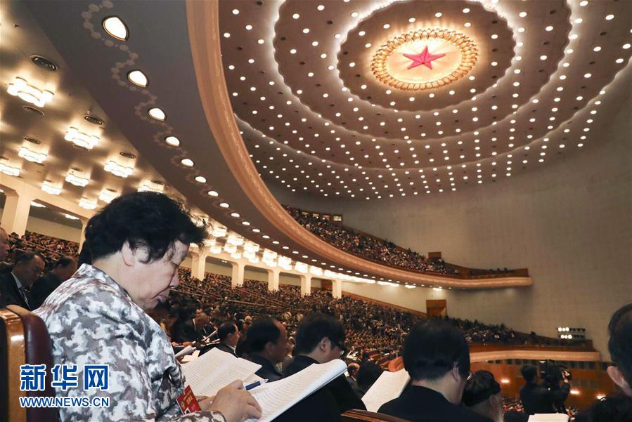 3月5日，第十二届全国人民代表大会第五次会议在北京人民大会堂开幕。这是全国政协委员列席大会。 新华社记者丁林摄