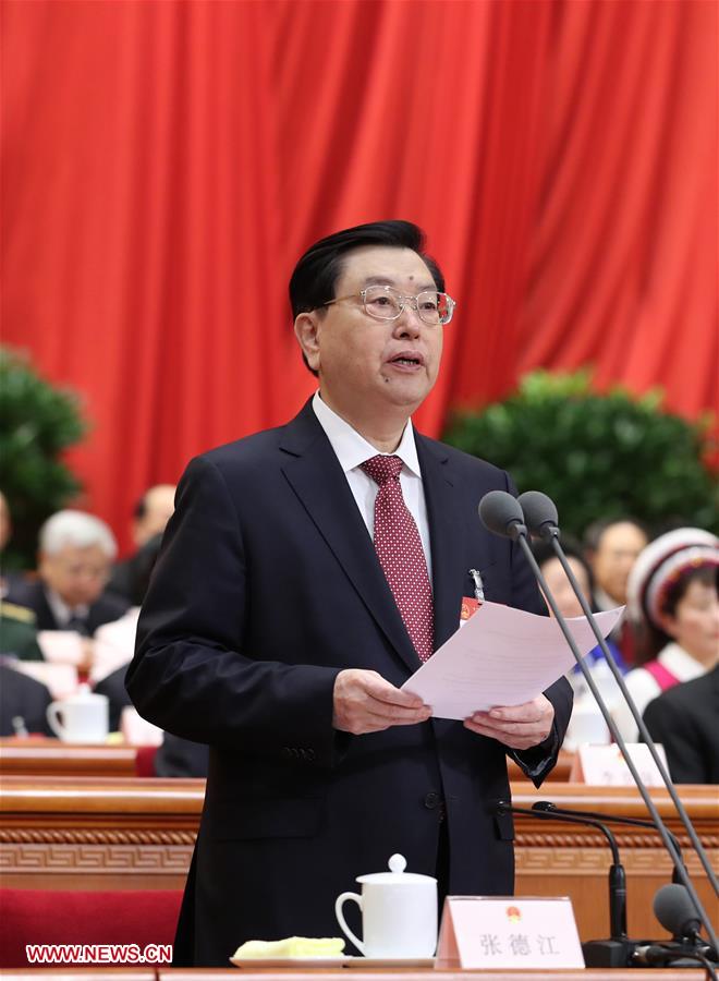 Zhang Dejiang, chairman of the Standing Committee of China's National People's Congress (NPC), presides over the opening meeting of the fifth session of the 12th NPC in Beijing, capital of China, March 5, 2017. (Xinhua/Pang Xinglei)
