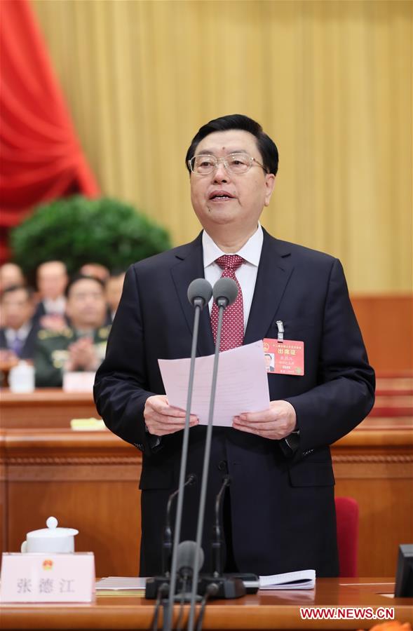 Zhang Dejiang, chairman of the Standing Committee of China's National People's Congress (NPC), presides over the opening meeting of the fifth session of China's 12th NPC in Beijing, capital of China, March 5, 2017. (Xinhua/Lan Hongguang)