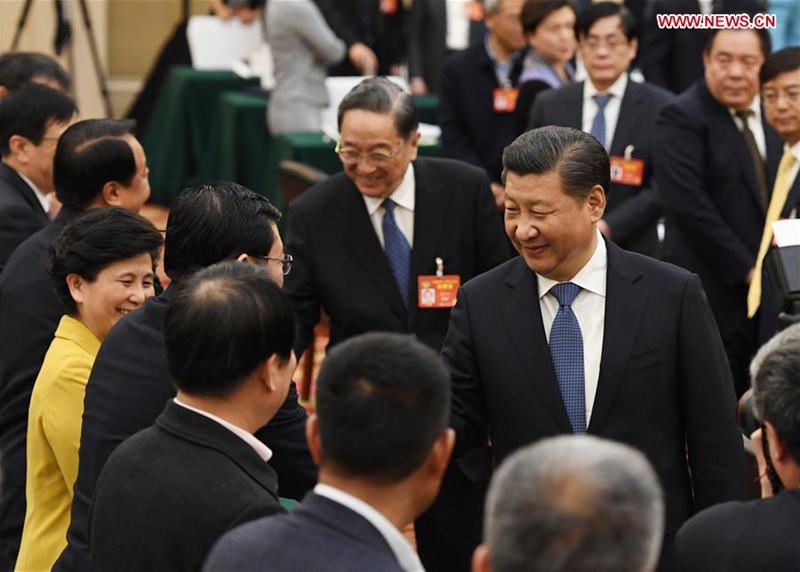 Chinese President Xi Jinping joins a panel discussion with political advisors from the China Association for Promoting Democracy, the Chinese Peasants and Workers Democratic Party and the Jiu San Society at the fifth session of the 12th National Committee of the Chinese People's Political Consultative Conference (CPPCC) in Beijing, capital of China, March 4, 2017. Yu Zhengsheng, chairman of the National Committee of the CPPCC, also joined the panel discussion. (Xinhua/Rao Aimin)