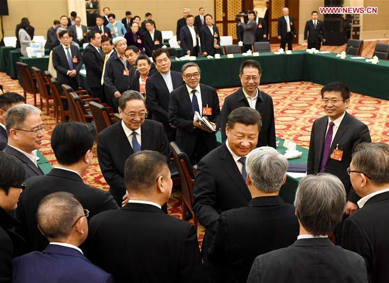Chinese President Xi Jinping joins a panel discussion with political advisors from the China Association for Promoting Democracy, the Chinese Peasants and Workers Democratic Party and the Jiu San Society at the fifth session of the 12th National Committee of the Chinese People's Political Consultative Conference (CPPCC) in Beijing, capital of China, March 4, 2017. Yu Zhengsheng, chairman of the National Committee of the CPPCC, also joined the panel discussion. (Xinhua/Rao Aimin)