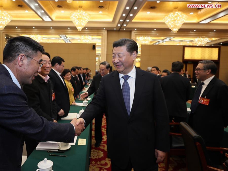 Chinese President Xi Jinping joins a panel discussion with political advisors from the China Association for Promoting Democracy, the Chinese Peasants and Workers Democratic Party and the Jiu San Society at the fifth session of the 12th National Committee of the Chinese People's Political Consultative Conference (CPPCC) in Beijing, capital of China, March 4, 2017. Yu Zhengsheng, chairman of the National Committee of the CPPCC, also joined the panel discussion. (Xinhua/Ju Peng)