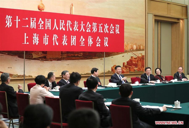Chinese President Xi Jinping joins a panel discussion with deputies to the 12th National People's Congress (NPC) from Shanghai Municipality at the annual session of the NPC in Beijing, capital of China, March 5, 2017. (Xinhua/Lan Hongguang)