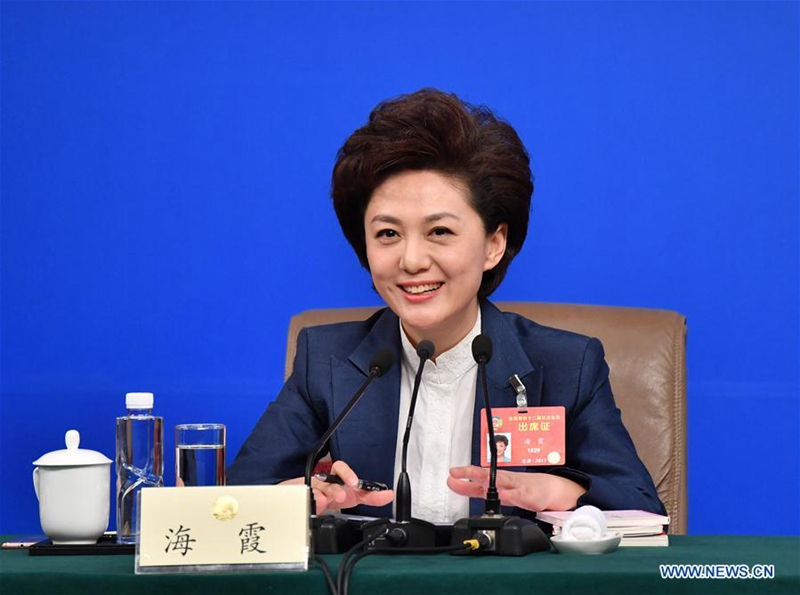 Hai Xia, a member of the 12th National Committee of the Chinese People's Political Consultative Conference (CPPCC), attends a press conference for the fifth session of the 12th CPPCC National Committee in Beijing, capital of China, March 7, 2017. The International Women's Day falls on March 8, during the ongoing sessions of China's National People's Congress (NPC) and the Chinese People's Political Consultative Conference (CPPCC). (Xinhua/Li Xin) 