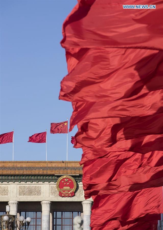 Photo taken on March 12, 2017 shows red flags at the Tian'anmen Square in Beijing, capital of China. The third plenary meeting of the fifth session of the 12th National People's Congress opened in Beijing on Sunday. (Xinhua/Fei Maohua)