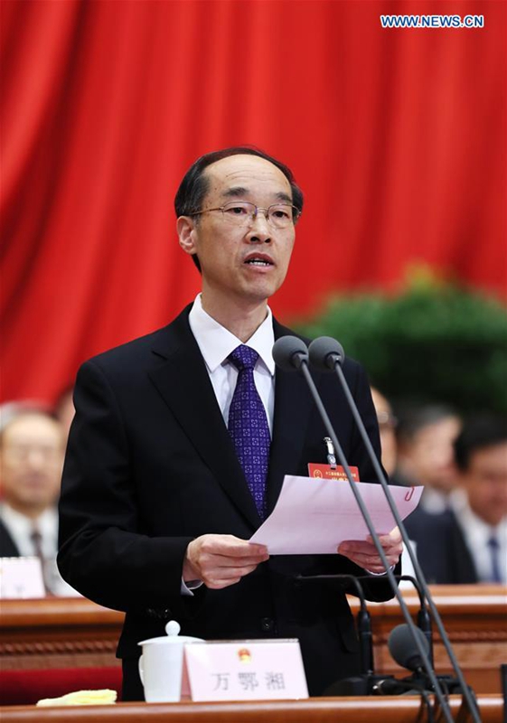 Wan Exiang presides over the third plenary meeting of the fifth session of the 12th National People's Congress at the Great Hall of the People in Beijing, capital of China, March 12, 2017. (Xinhua/Lan Hongguang)