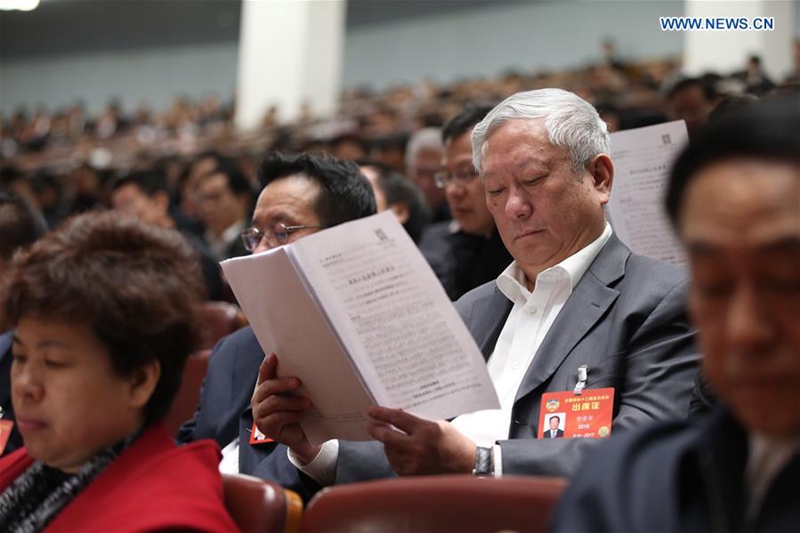 Members of the 12th National Committee of the Chinese People's Political Consultative Conference (CPPCC) attend the third plenary meeting of the fifth session of the 12th National People's Congress at the Great Hall of the People in Beijing, capital of China, March 12, 2017. (Xinhua/Jin Liwang)