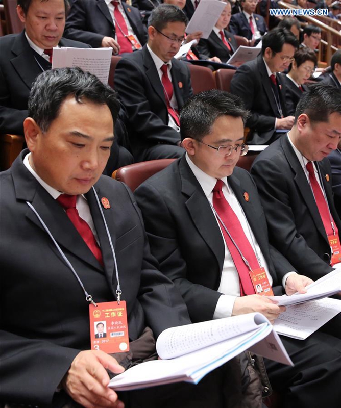 Deputies to China's 12th National People's Congress (NPC) attend the third plenary meeting of the fifth session of the 12th NPC at the Great Hall of the People in Beijing, capital of China, March 12, 2017. (Xinhua/Wang Jianhua) 