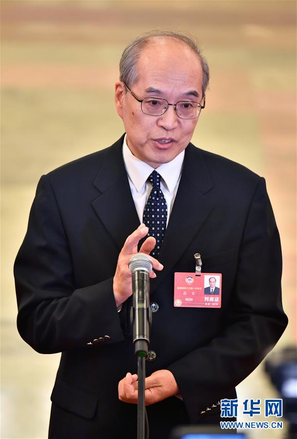　　3月3日，中国人民政治协商会议第十三届全国委员会第一次会议在北京人民大会堂开幕。这是司法部部长张军在接受采访。 新华社记者 李鑫 摄