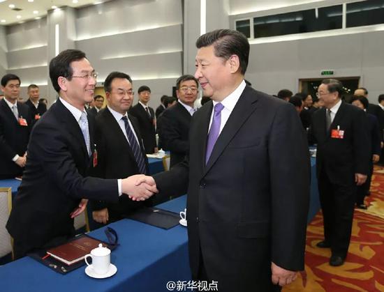 2016年3月4日下午，习近平看望出席全国政协十二届四次会议民建、工商联界委员并参加联组讨论。