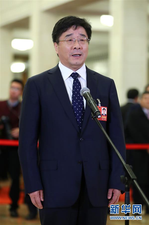 　　3月15日，全国政协十三届一次会议在北京人民大会堂举行闭幕会。这是全国政协委员刘伟在“委员通道”接受采访。 新华社记者张玉薇摄