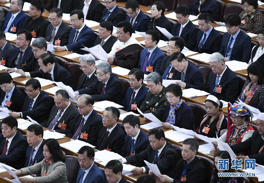 3月13日，中国人民政治协商会议第十三届全国委员会第二次会议在北京人民大会堂举行闭幕会。 新华社记者 殷博古 摄