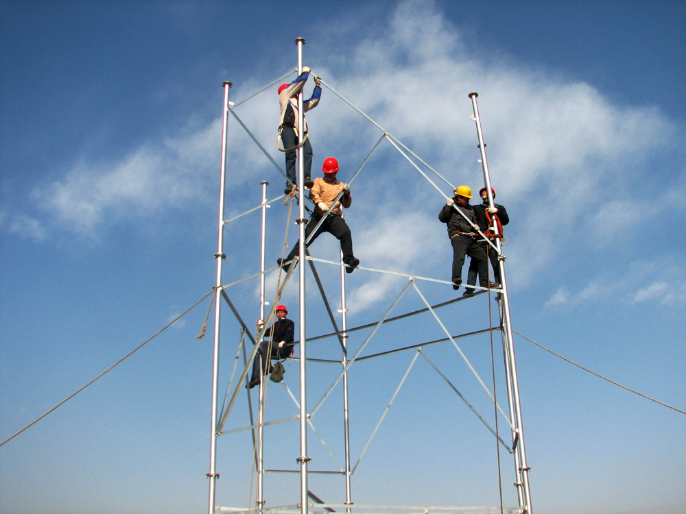 2009年北京联通进行大规模移动基站建设和优化，为3G商用做好准备