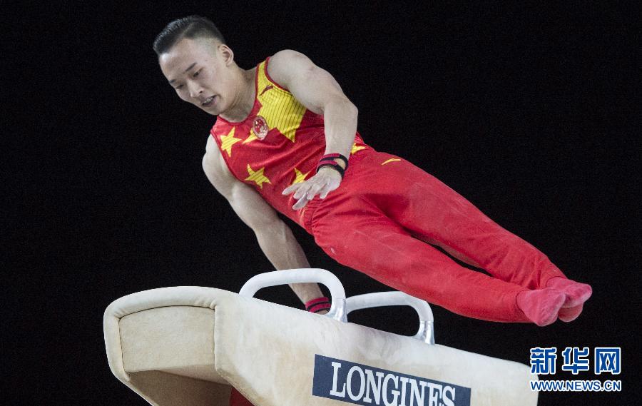 肖若腾在蒙特利尔世界体操锦标赛上获得男子全能冠军,成为李小双,冯敬
