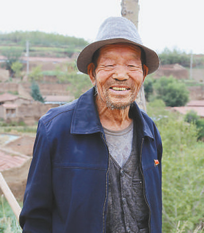 青海互助县农民李洪占63年义务植树8万余株一定让乡亲们看到绿德耀