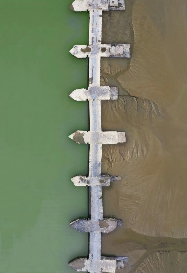 木兰陂一边为淡水，一边是滩涂。莆田文旅供图