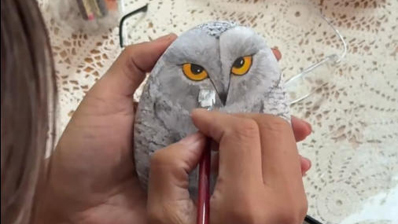 社区“文艺巧娘”擅长“点石成花”