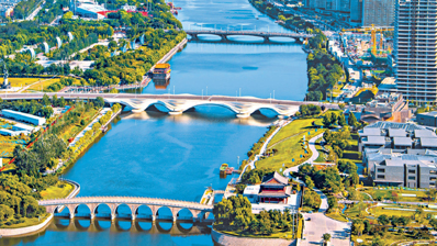 一条河的归来 一座城的转身